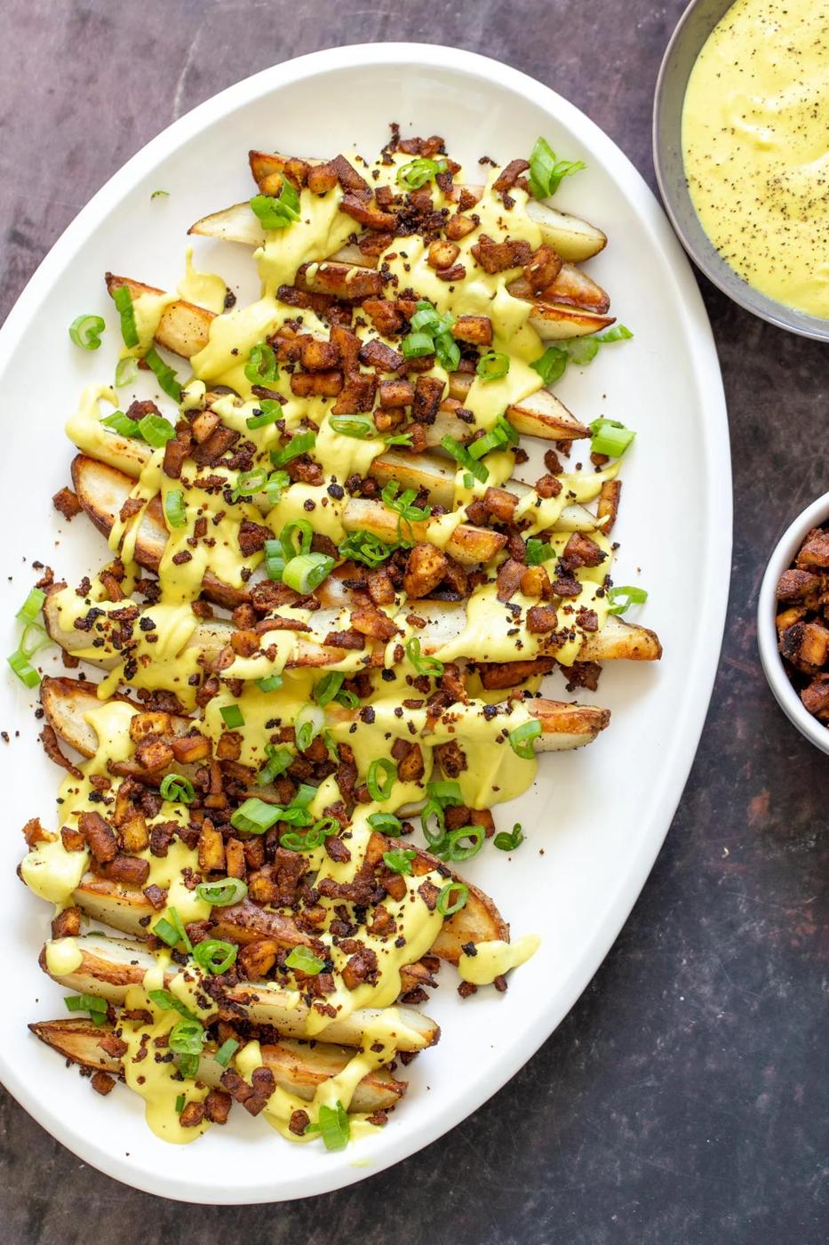 Loaded Baked Potato Wedges with Creamy Cheese Sauce and Tofu Bacony Bits