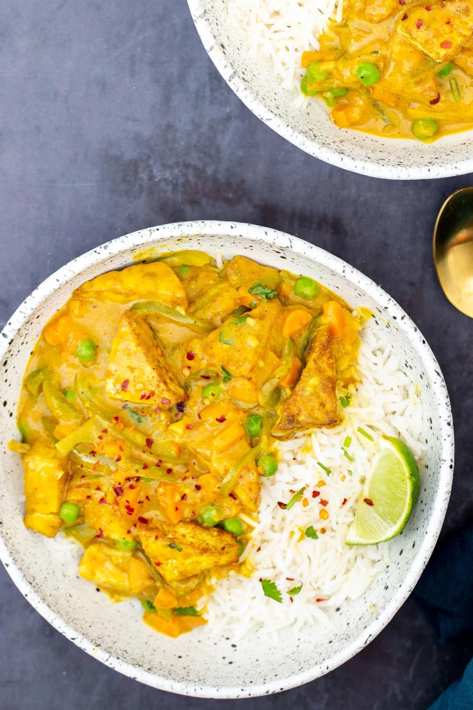 Malaysian Coconut curry with crispy tofu served with a side of rice