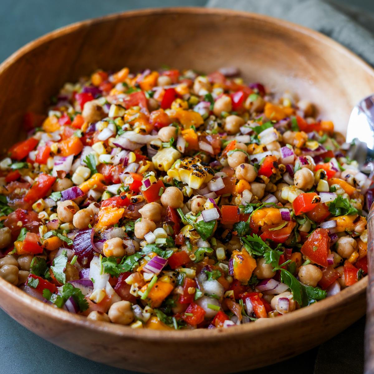 Mango Chickpea Salad with cumin lime toasted pepper dressing