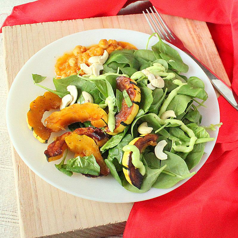 Maple glazed Delicata squash, cashews, baby spinach salad with creamy wasabi dressing. vegan glutenfree
