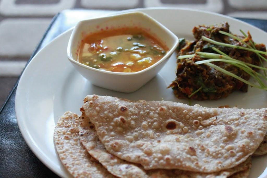Meal Series: Baingan Bharta, Sambhar, Roti and Papad (Roasted mashed eggplant, Pigeon Pea curry, Indian flat bread and Lentil chips)