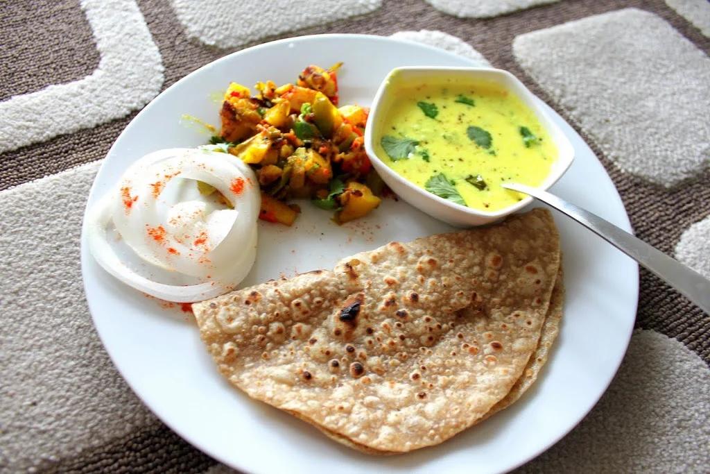 Meal Series: Tempered Cashew yogurt, spiced potatoes and bell peppers with Indian flat bread( Kadhi, Aloo Shimla Mirch, Roti)! Vegan