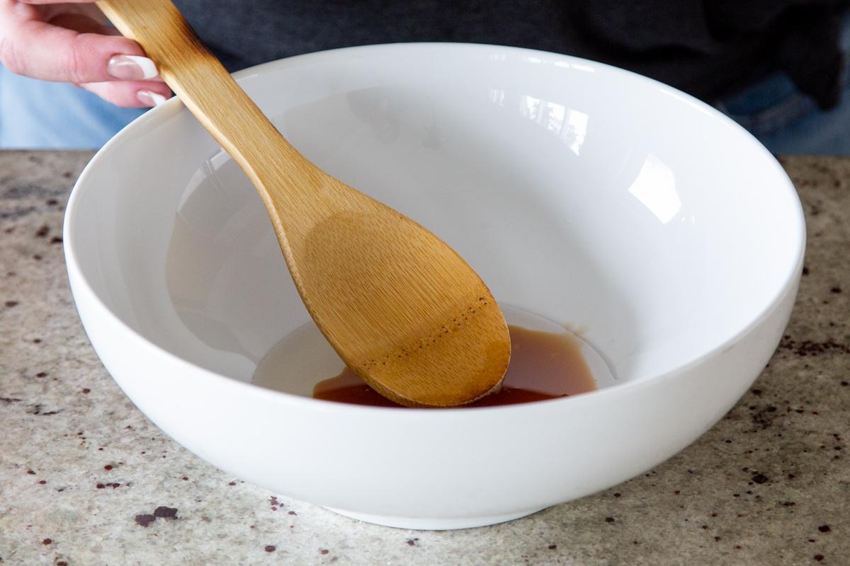 a white bowl with maple syrup and coconut oil