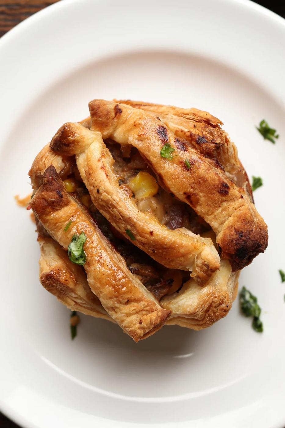 mini pot pie with a simple crust on a plate