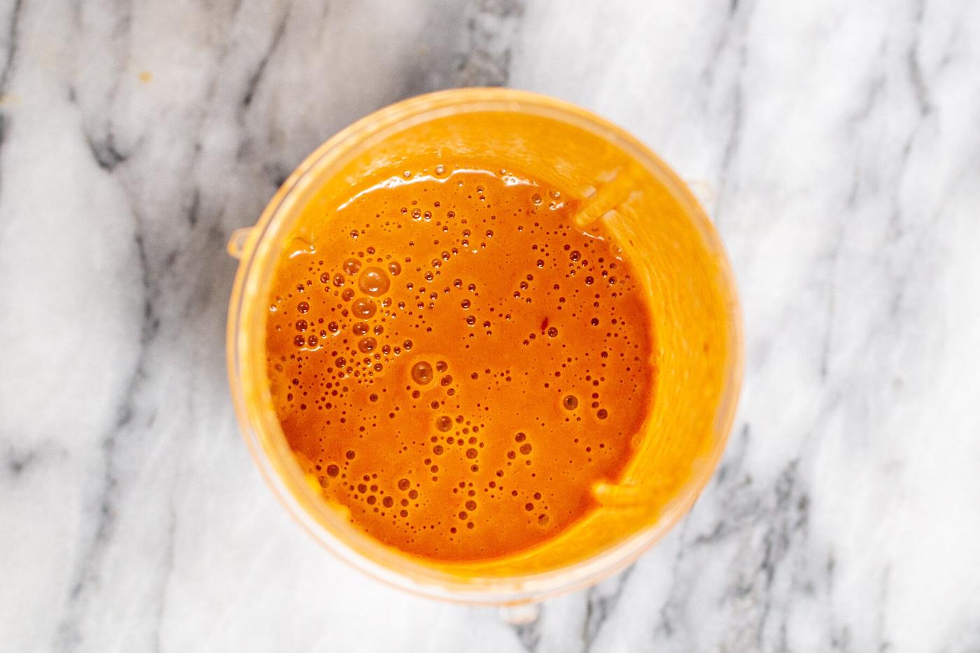 creamy stir-fry sauce in a small plastic container