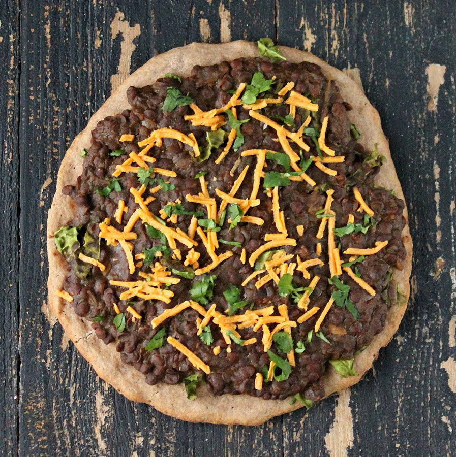 Missir Wot Pizza - Ethiopian Red lentil stew and Kale on Gluten free teff pizza crust. Gluten-free Pizza with ethiopian lentil topping. | VeganRicha.com #vegan #glutenfree #recipe