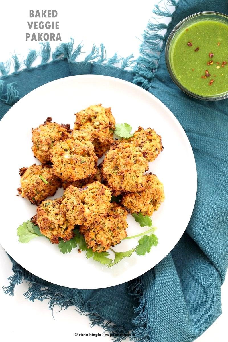 Broccoli, Cauliflower, potatoes, carrots and greens in this Mixed Vegetable Pakora. Baked Veggie Pakore Bhajjiya. Vegan Soyfree Recipe. Easily Glutenfree | VeganRicha.com