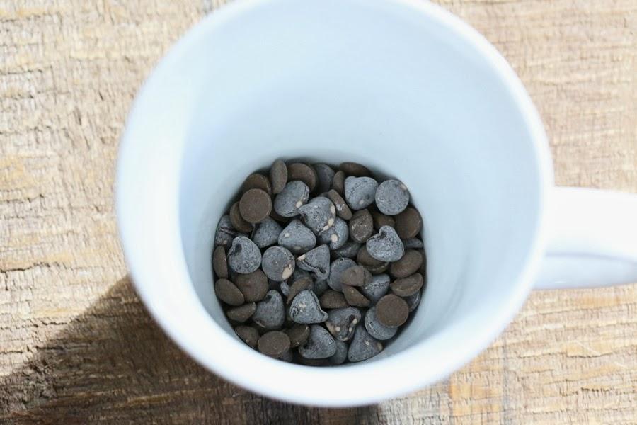 dark chocolate chips in a white cup