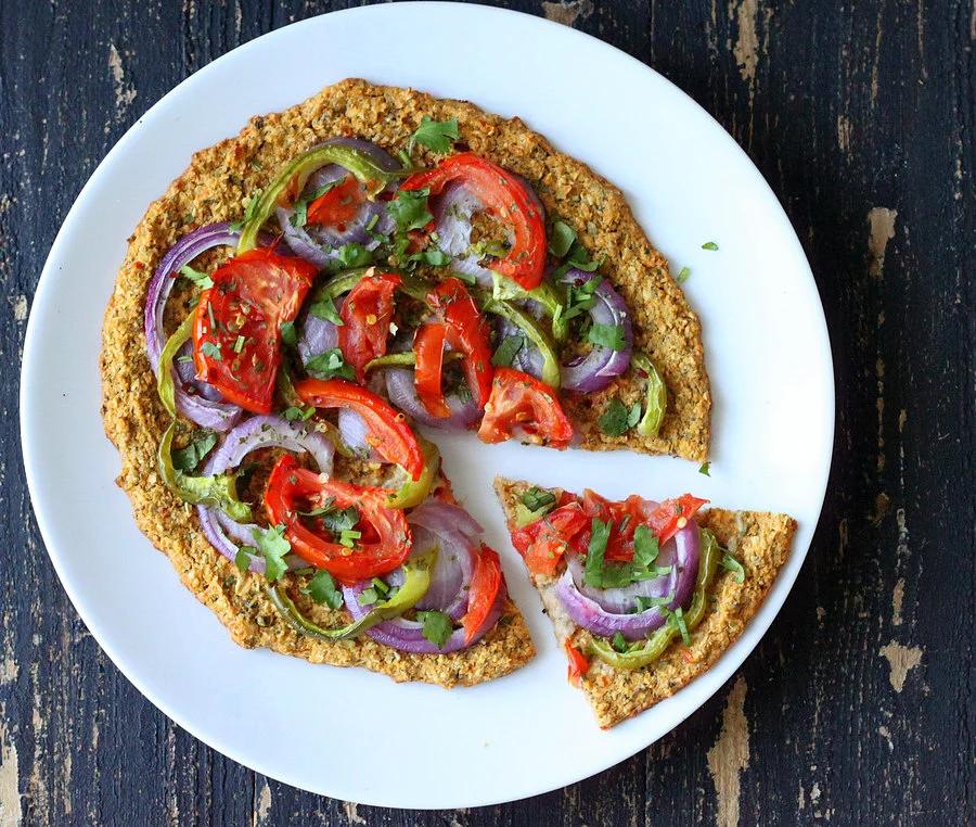 Spinach & Mung Bean Sprout Pizza Crust Pizza topped with Red onion, green bell pepper, tomatoes, garam masala. glutenfree vegan recipe