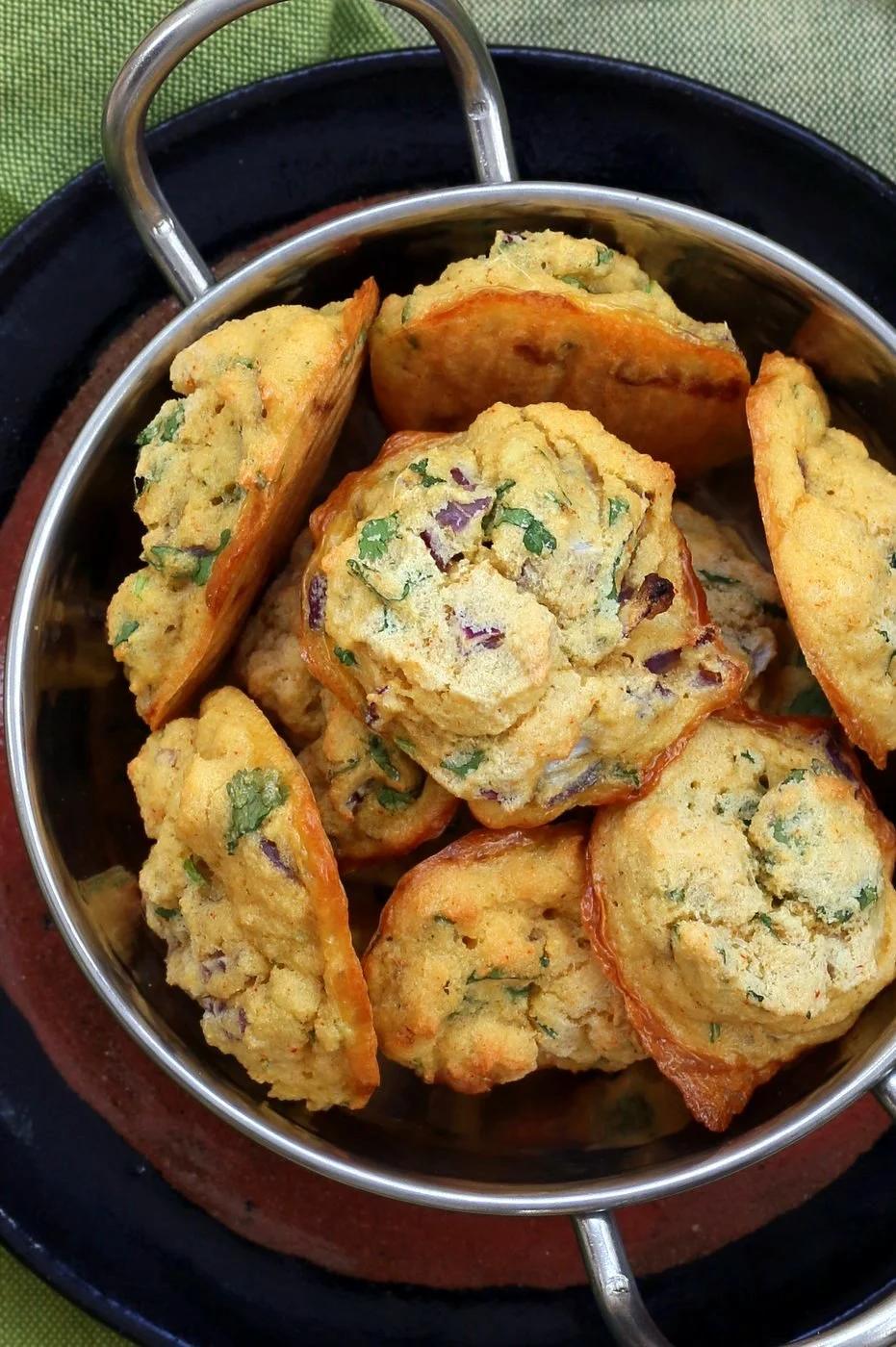 Mung Dal Fritters - Baked Moong Dal Pakoda. Petite yellow lentils (split and skinned mung beans) soaked and blended to a batter to make pakoda/Bhajji with onions and greens. Use red lentils or chickpea flour for variation. Vegan Gluten-free Recipe | VeganRicha.com