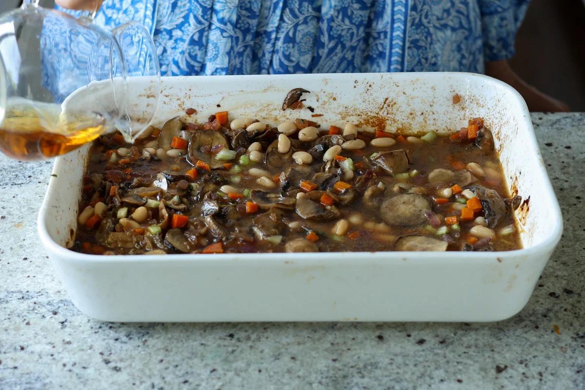 beans and veggies mixed together in the pan