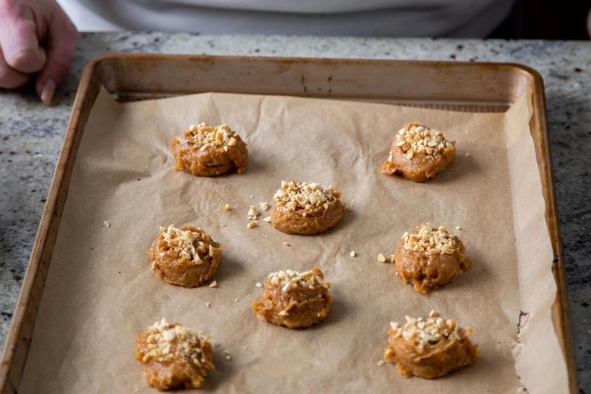 vegan no flour peanut butter cookies before baking on a cookie sheet