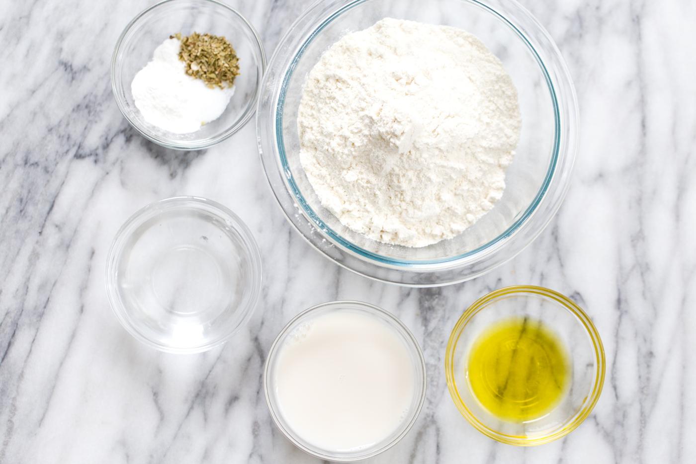 overhead shot of ingredients used for making vegan yeast-free pizza dough