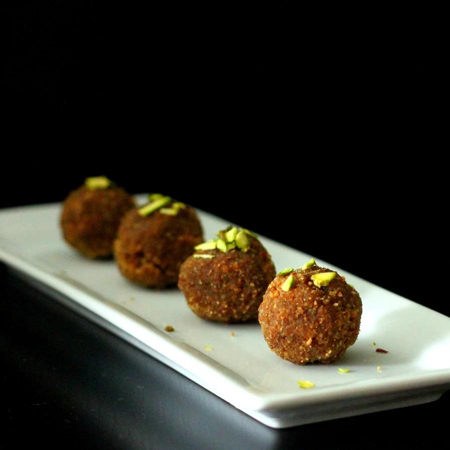 These Oil-free Wheat laddoo are soft and delicious. Make them with any other whole grain flour or make Atte ka Choorma crumble. Vegan Indian Sweet | https://veganricha.com #vegan #dairyfree #Indian
