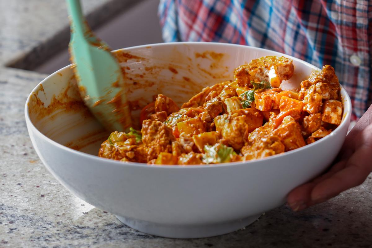 veggies and tofu tossed in the spice paste