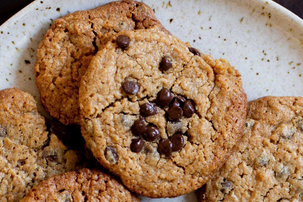 close-up of peanut butter cookies with chocolate chips on a plate