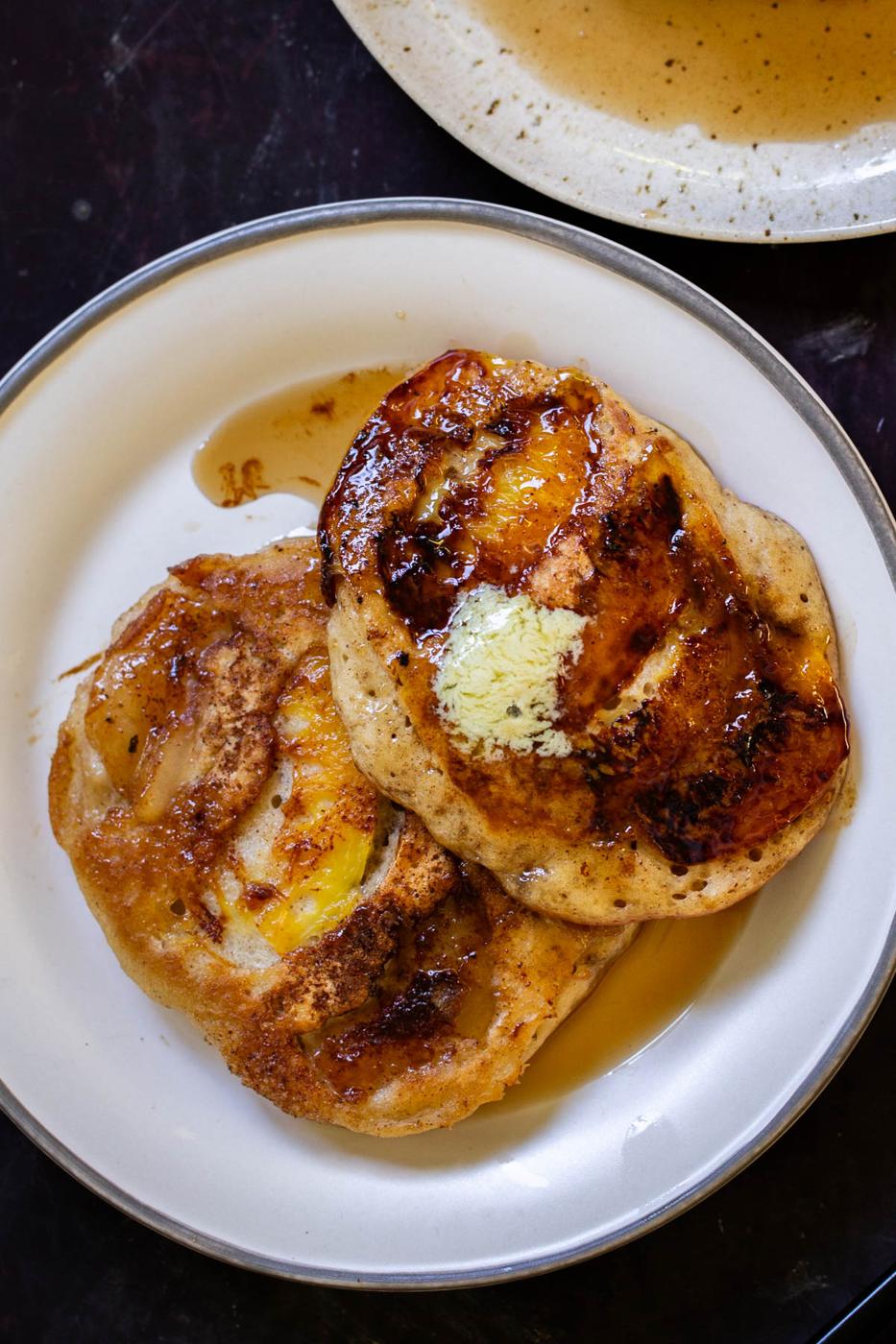 a plate of peach upside-down pancakes