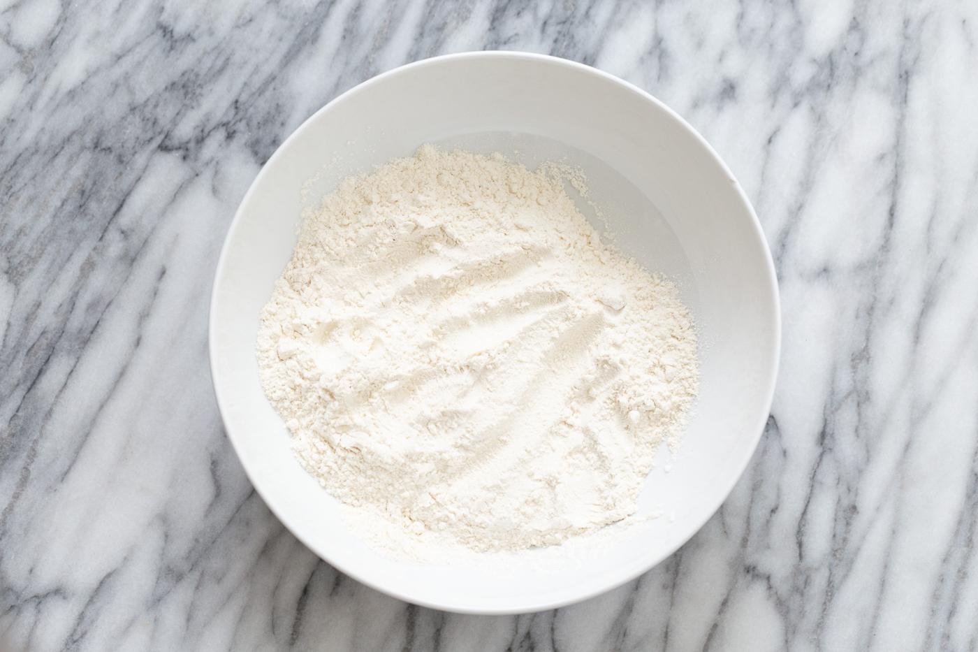 dry cake mix in a white bowl