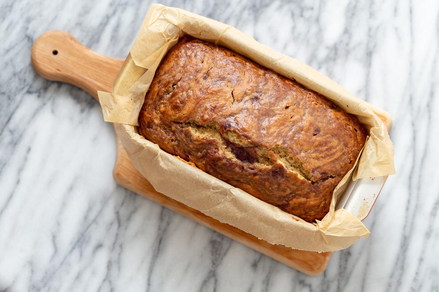 a freshly baked vegan peanut butter and jelly cake in a loaf pan