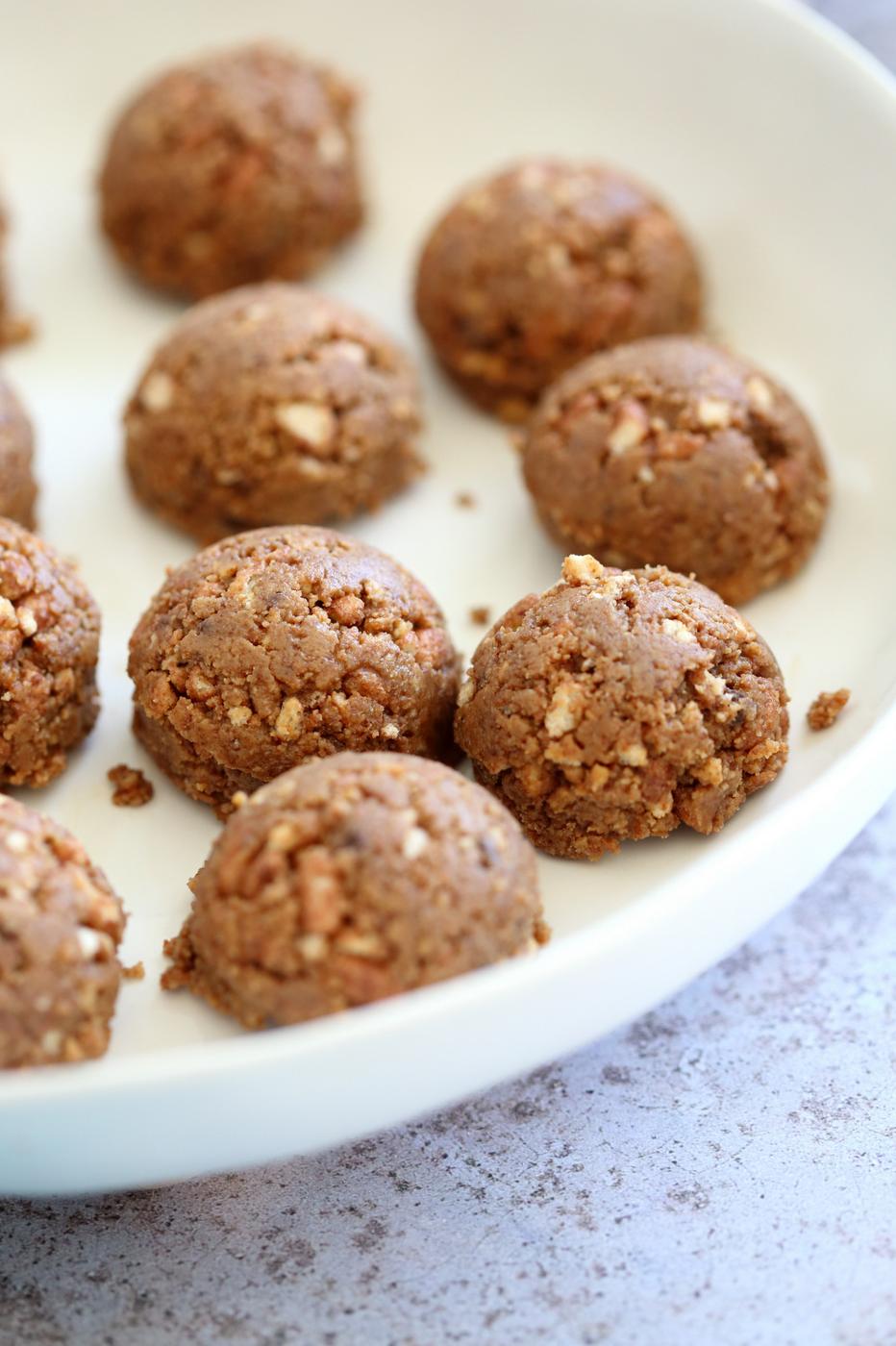 Our Peanut butter balls with Rice Krispies or Oats in a White Bowl