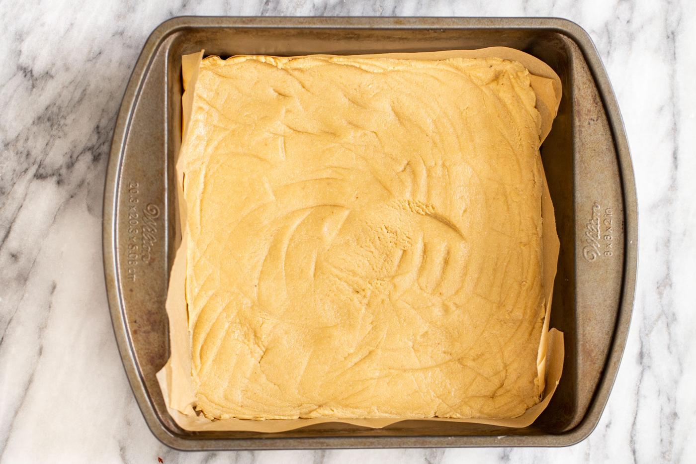 unbaked cookie crust in baking pan