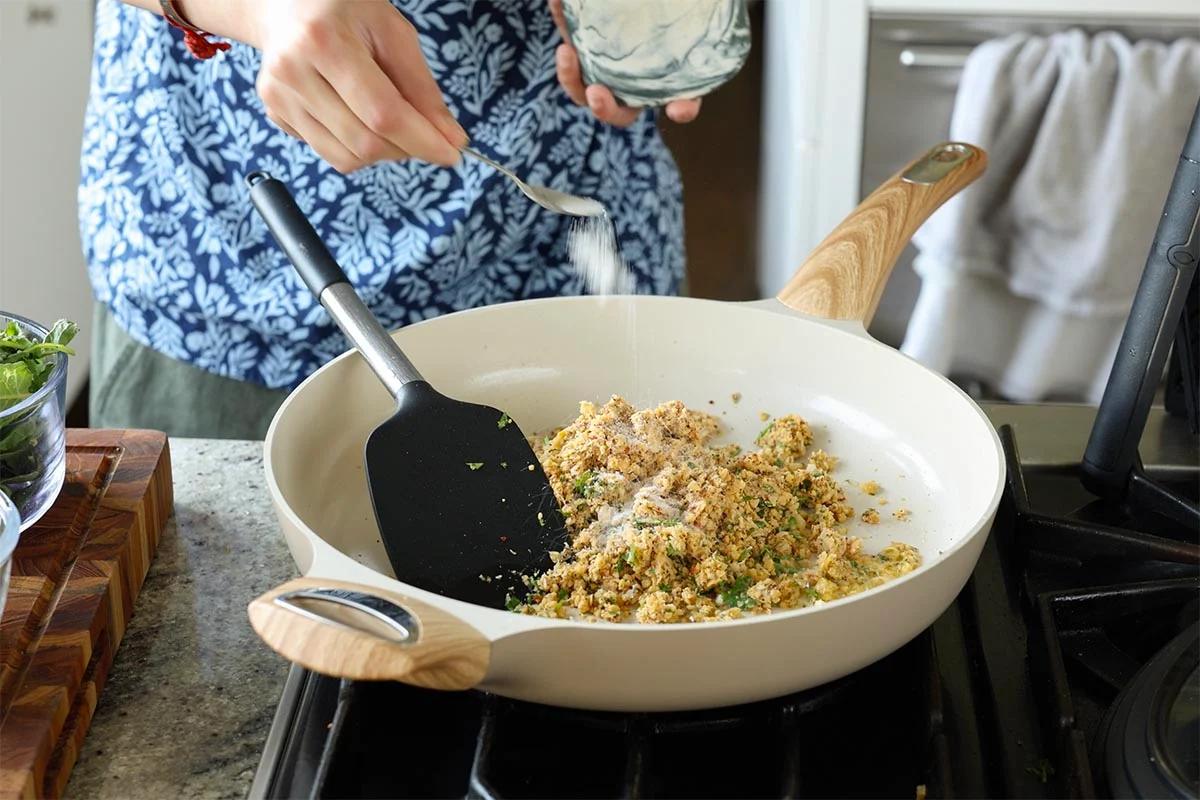adding chickpea mixture to the pan
