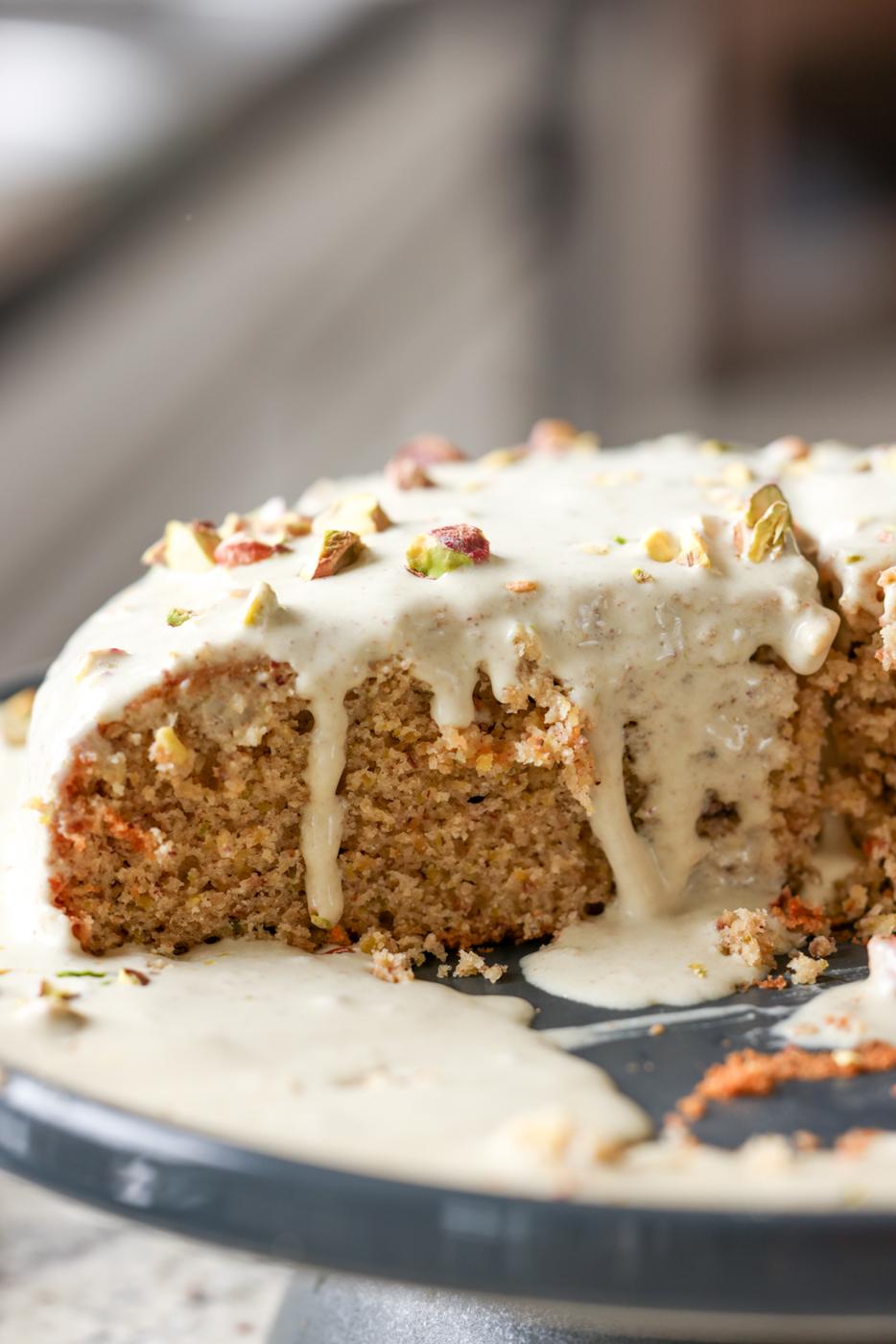 pistachio cake with pistachio cream on it