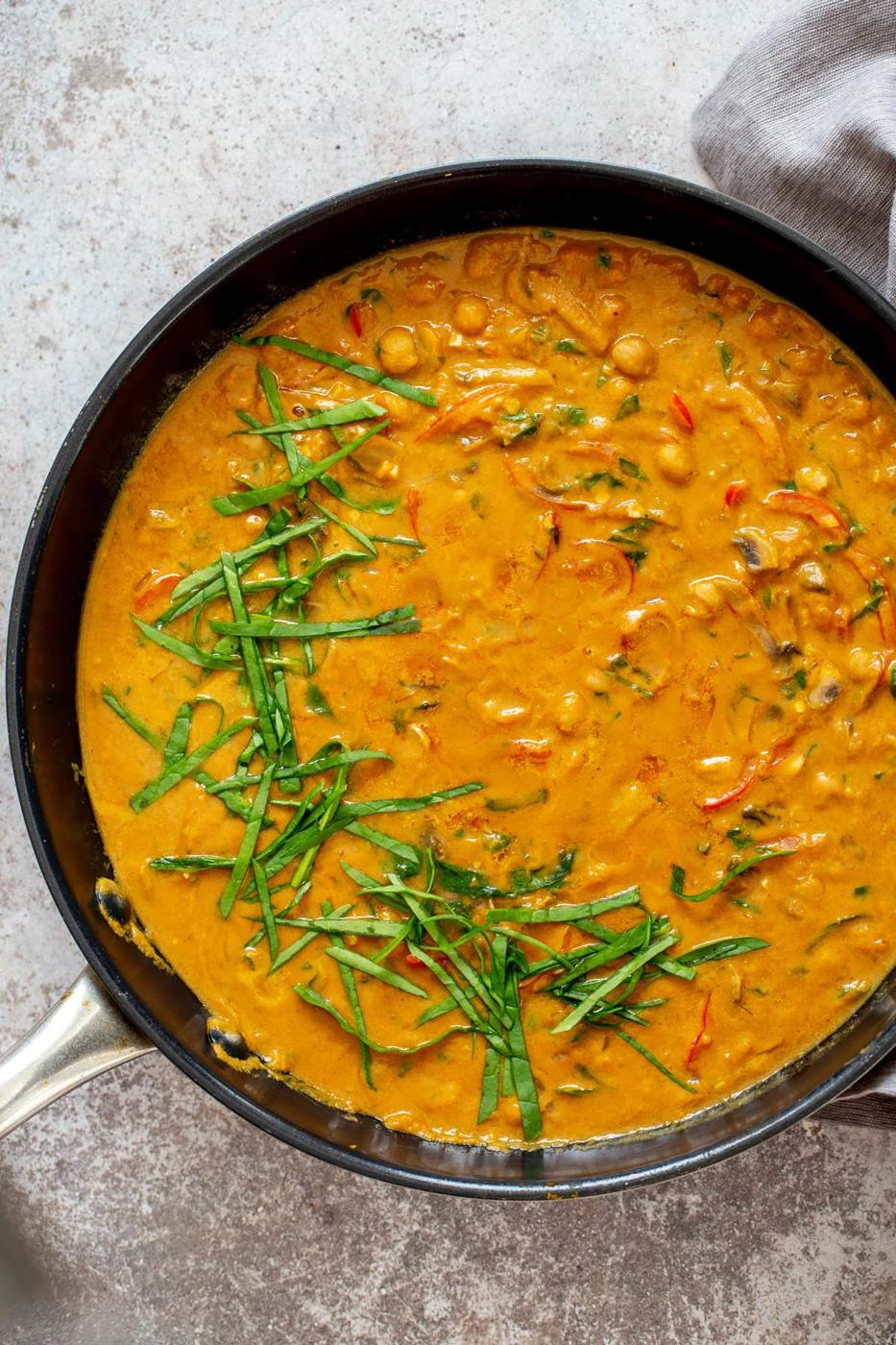 overhead shot of a skillet with pumpkin chickpea curry