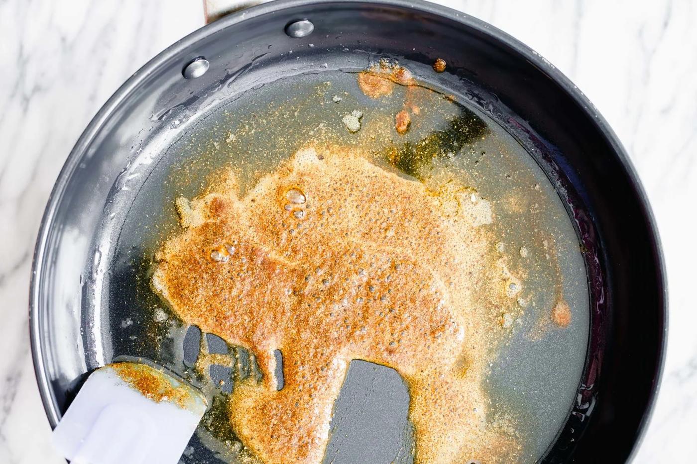 warming Indian spices being fried in oil to make pumpkin curry
