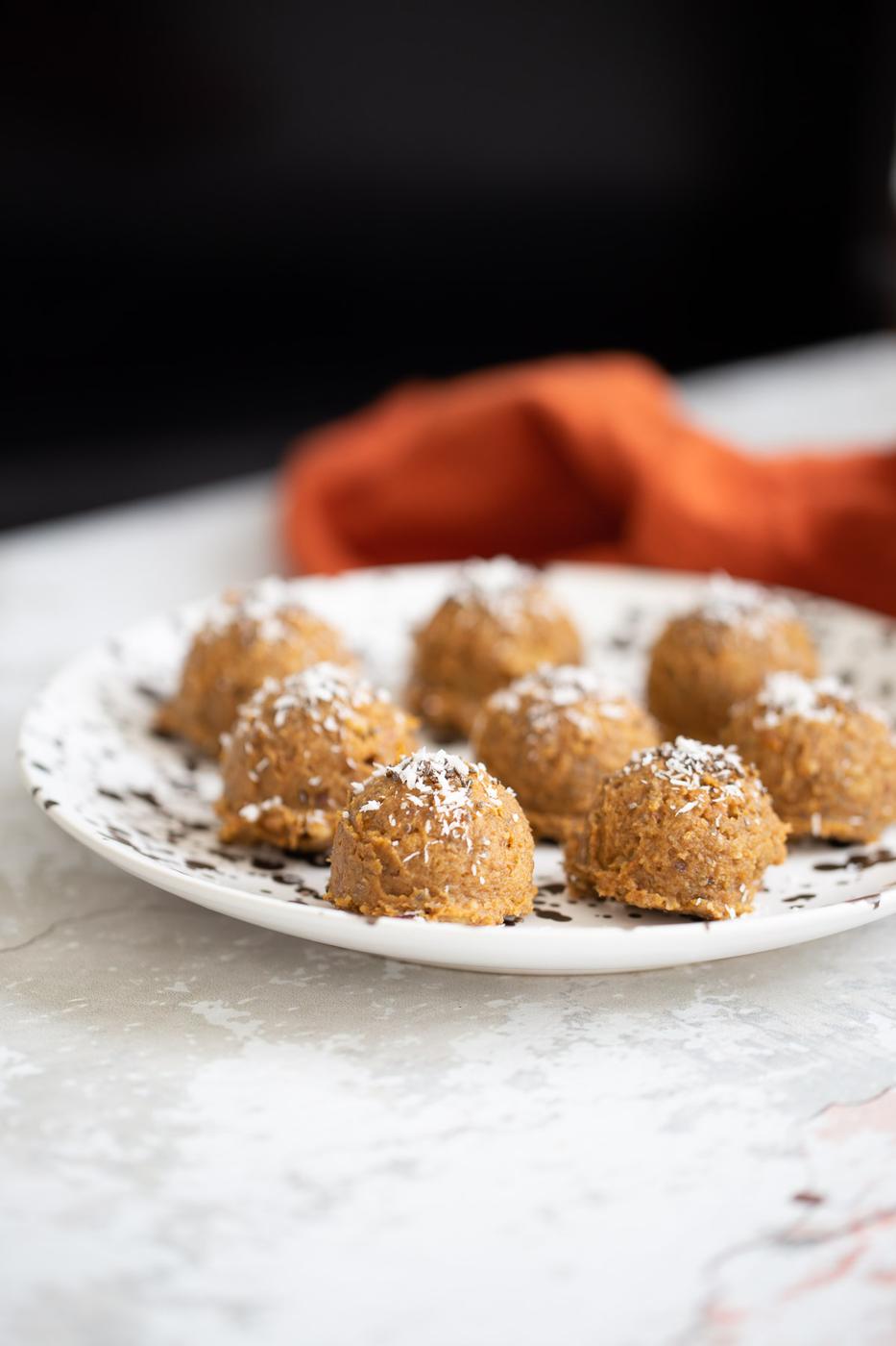 pumpkin pie energy balls on a white plate