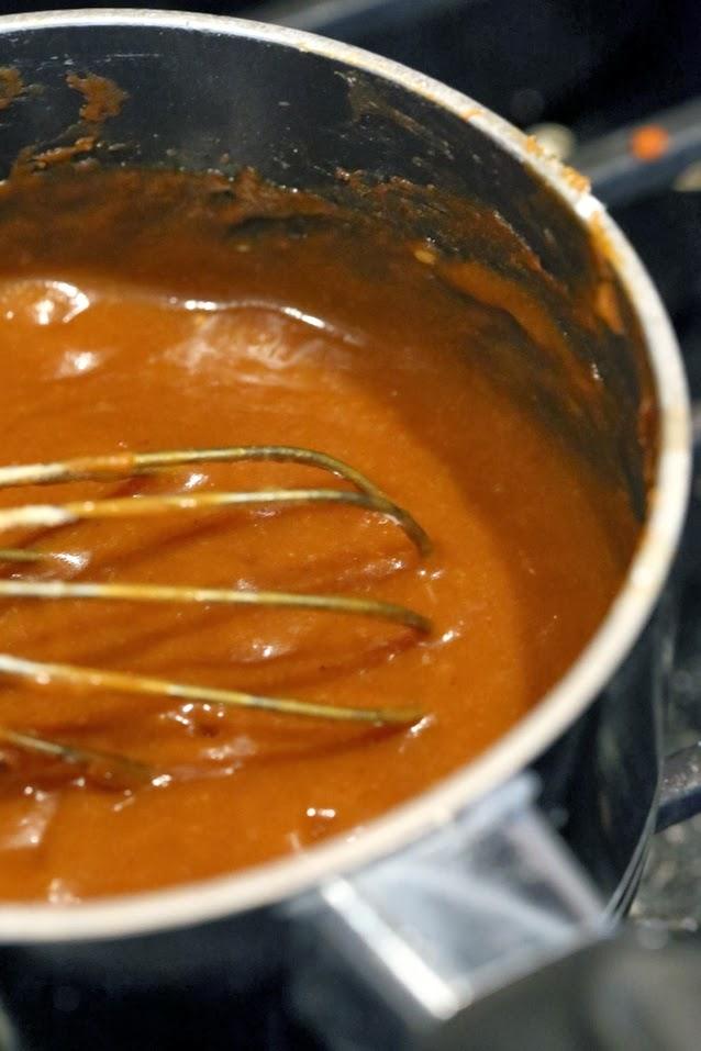 vegan pumpkin mousse being prepared in a silver pot