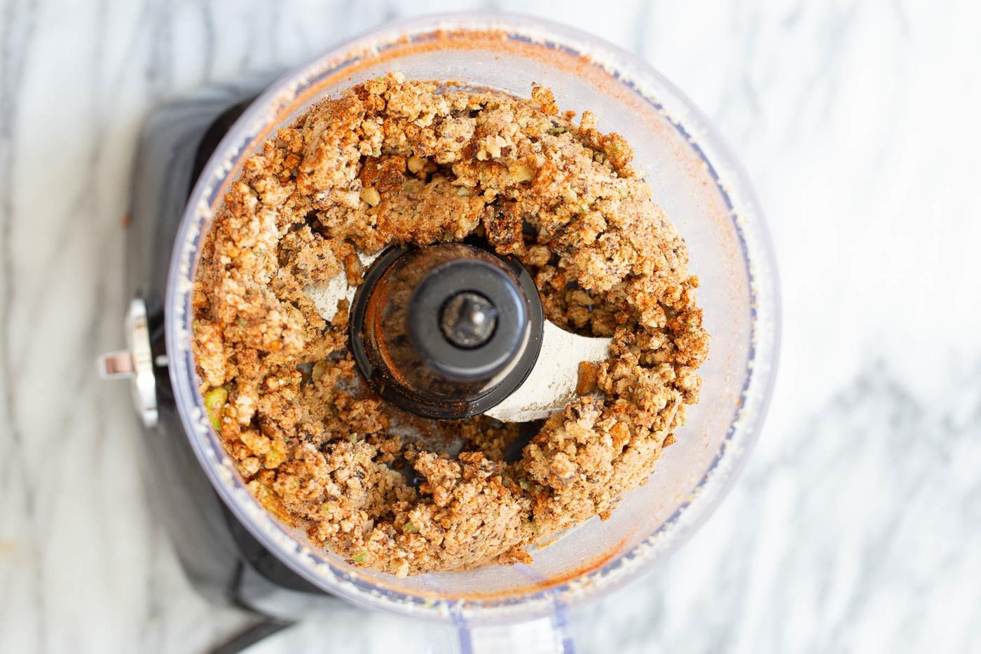 overhead shot of vegan walnut taco meat in a food processor