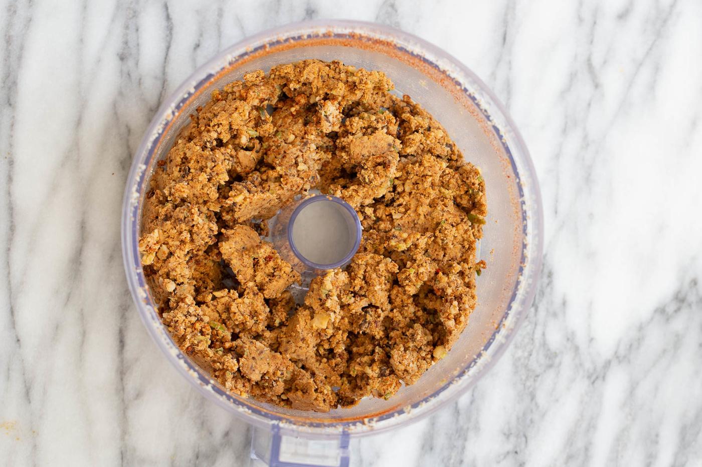 walnut chickpea taco meat in food processor container ready for vegan quesadilla recipe