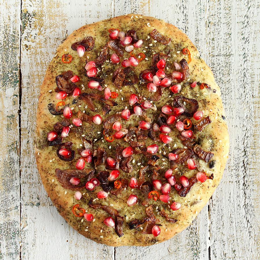 Quinoa Olive Focaccia Crust Pizza with Za’atar, Caramelized Onions and Pomegranate. vegan recipe