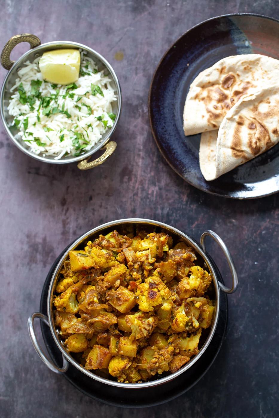 vegan aloo gobi with rice and flatbread