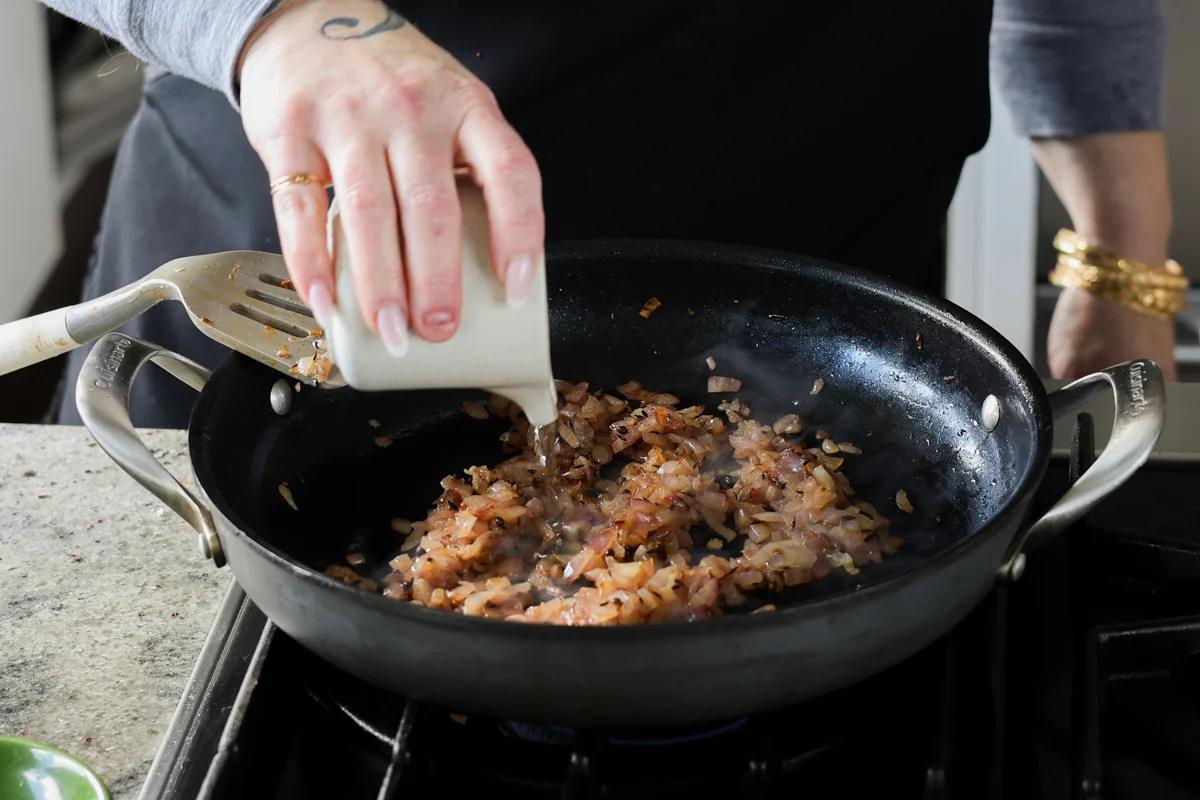adding water to the onion