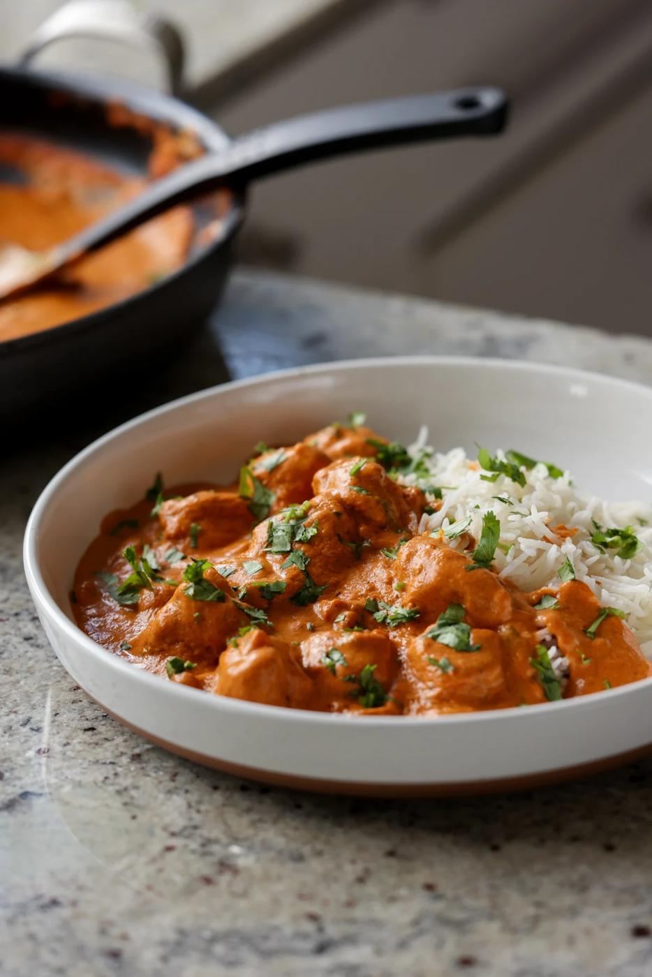 plate of vegan butter chicken with rice