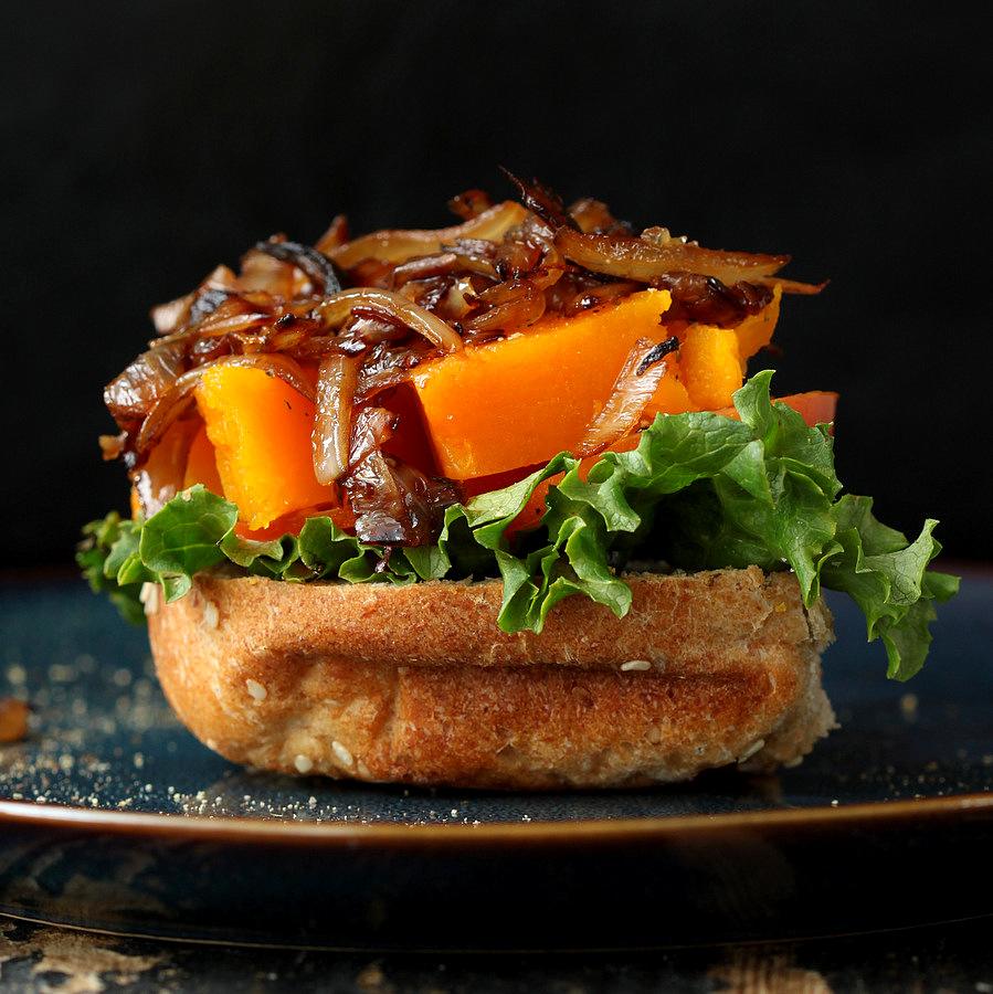 This roasted Butternut squash slider has balsamic caramelized onions and sriracha mayo. | VeganRicha.com #vegan #burger #slider