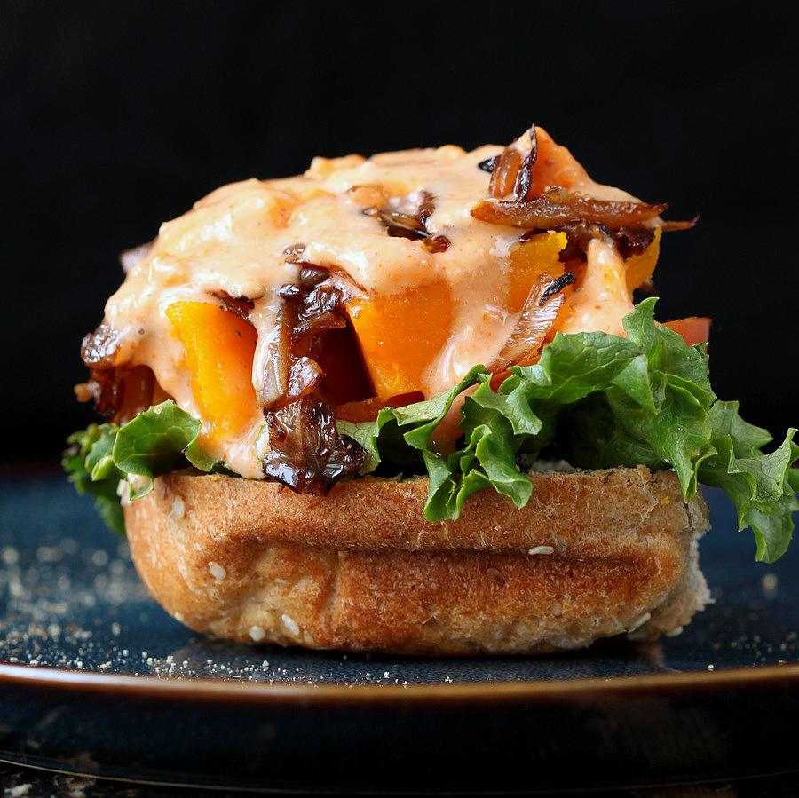 This Roasted Butternut squash slider has balsamic caramelized onions and sriracha mayo. | VeganRicha.com #vegan #burger #slider