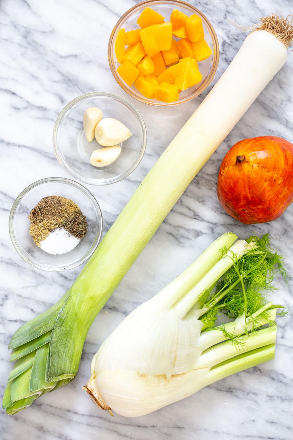 ingredients for roasted vegetables on a marble countertop