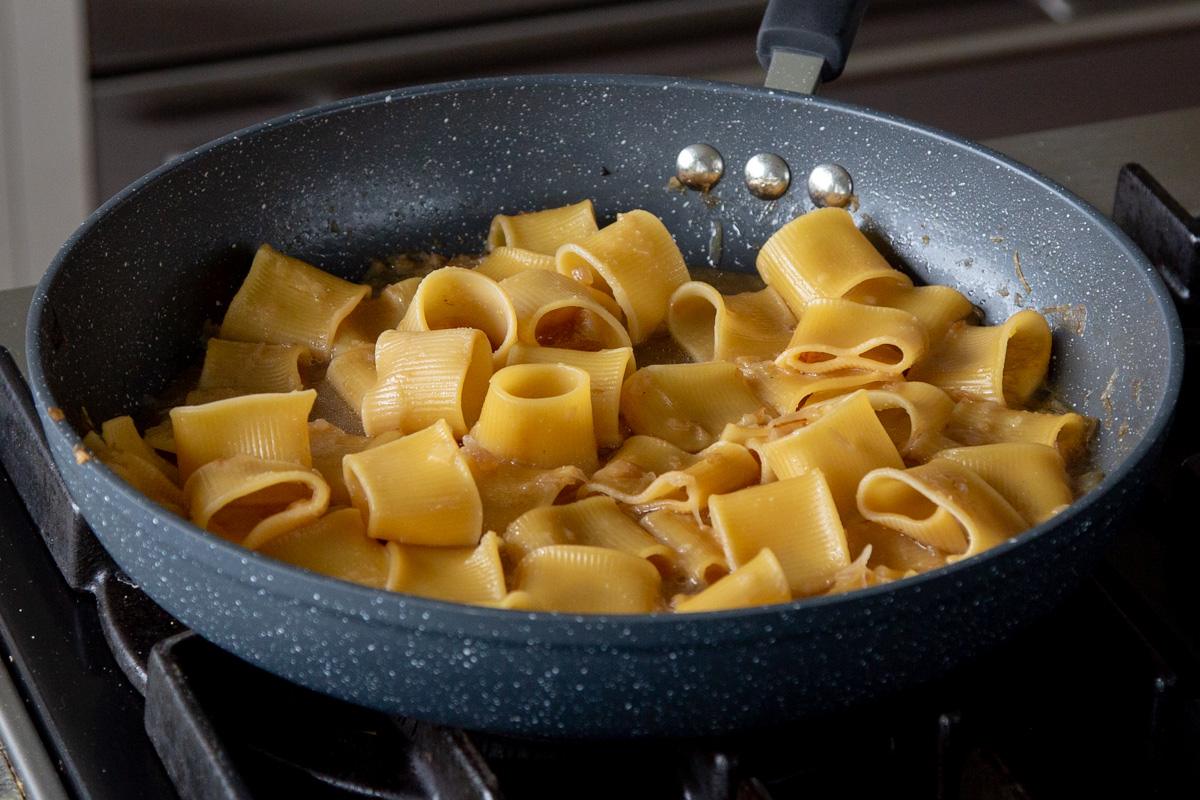 pasta added to the pan, after cooking