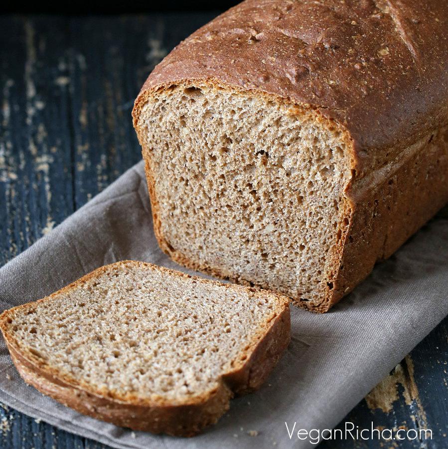 Vegan Rye Almond Sandwich Bread with one slice cut
