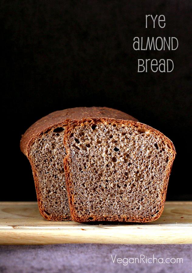 side view of vegan rye almond flour sandwich bread on a wooden board