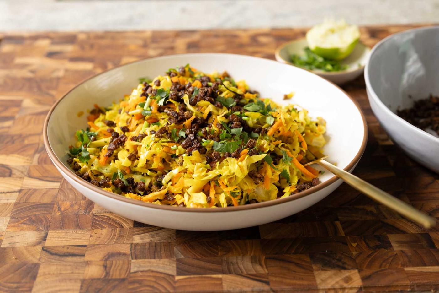 sambharo in a bowl with a spoon