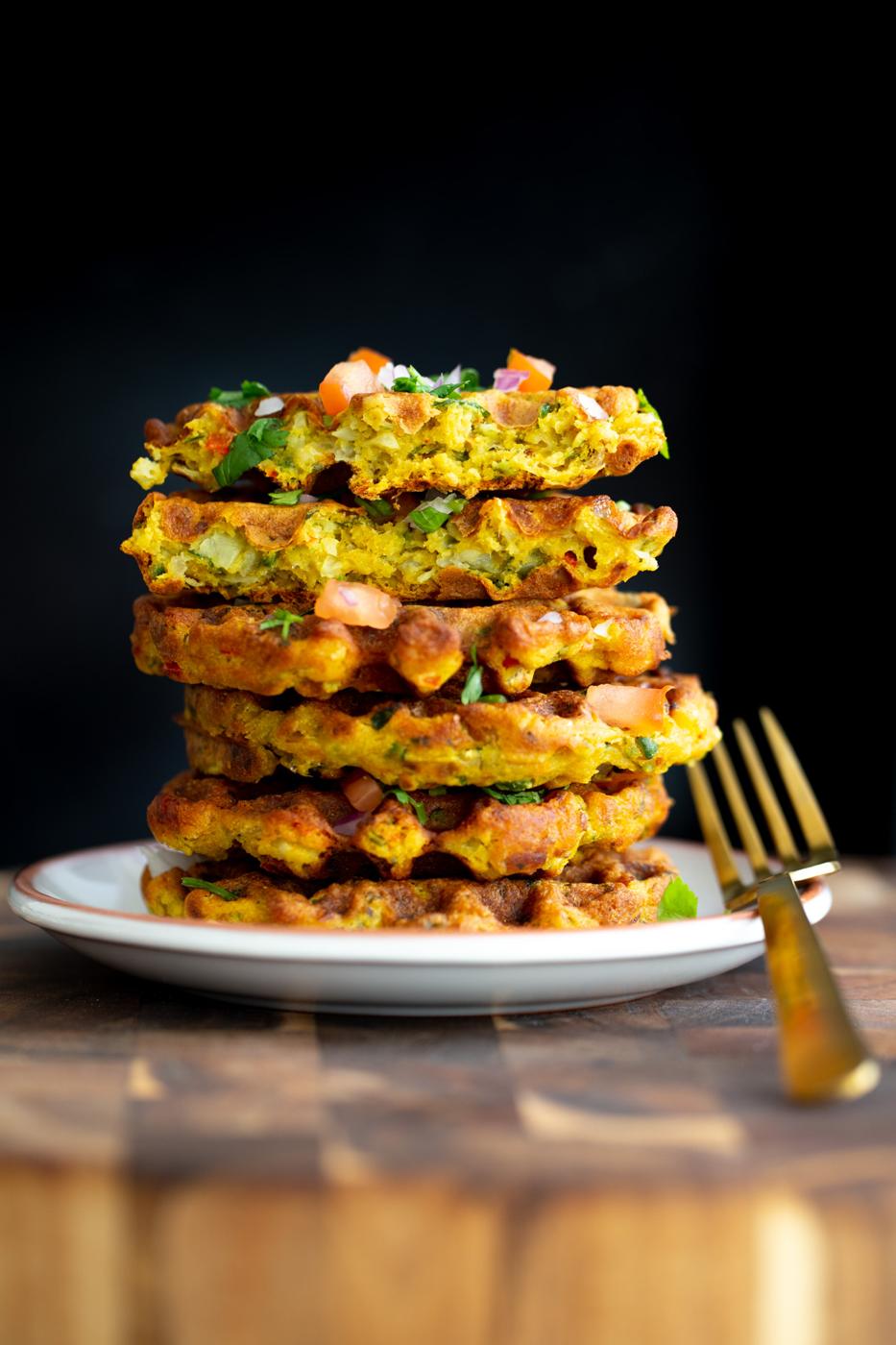 a stack of vegan savory chickpea flour waffles