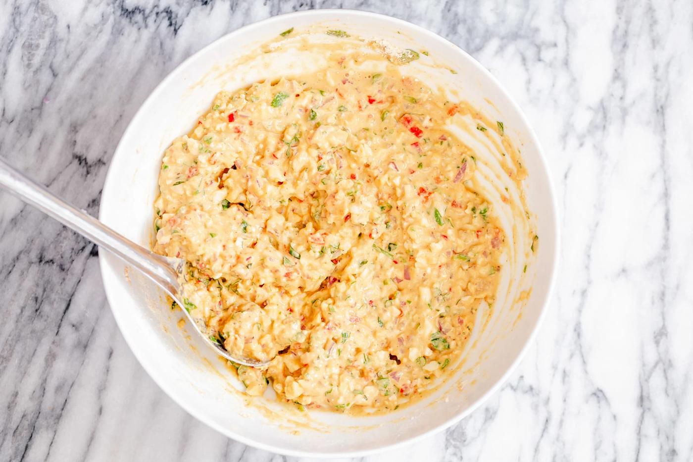 pakora waffle batter resting in a bowl