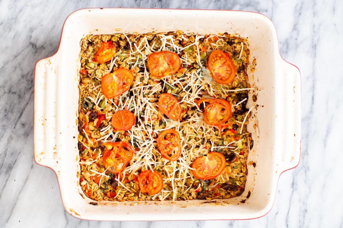 savory pizza oatmeal bake in a white casserole dish