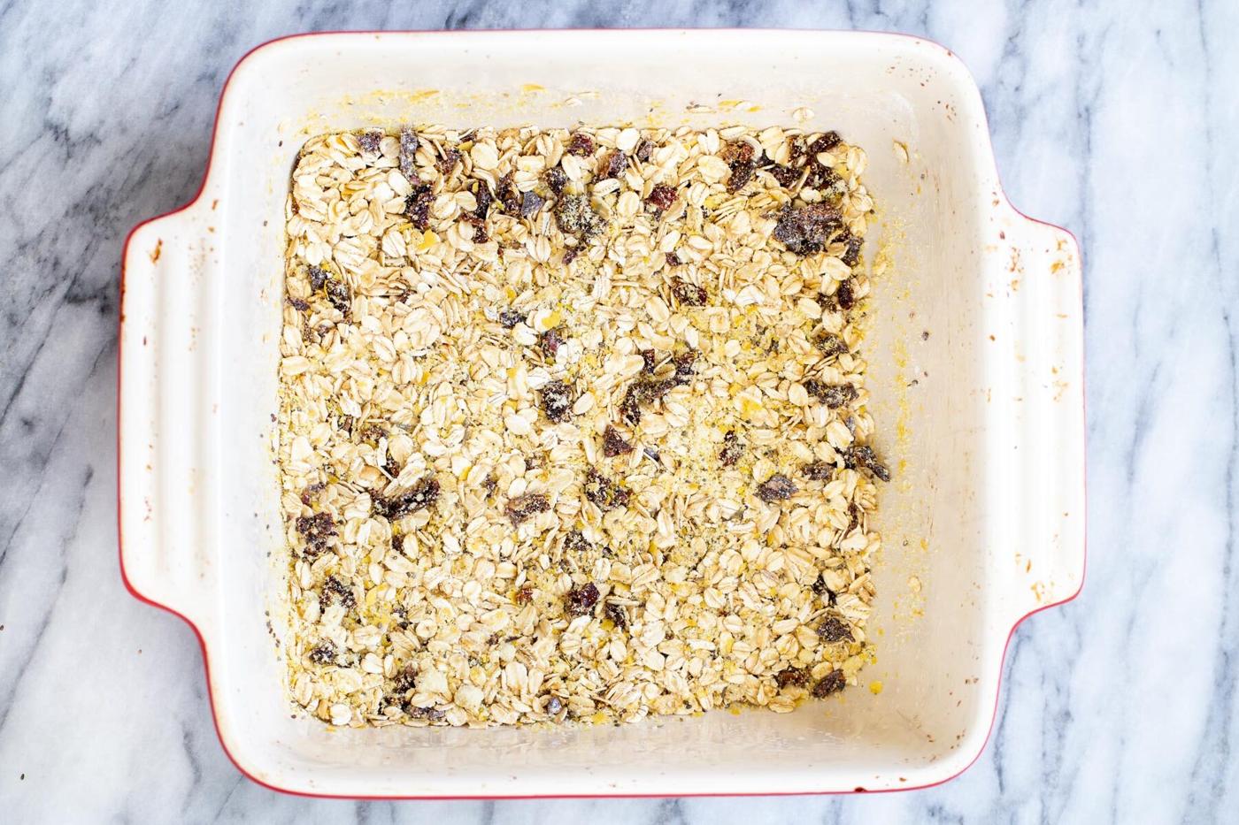 dried ingredients for oatmeal bake in a casserole dish