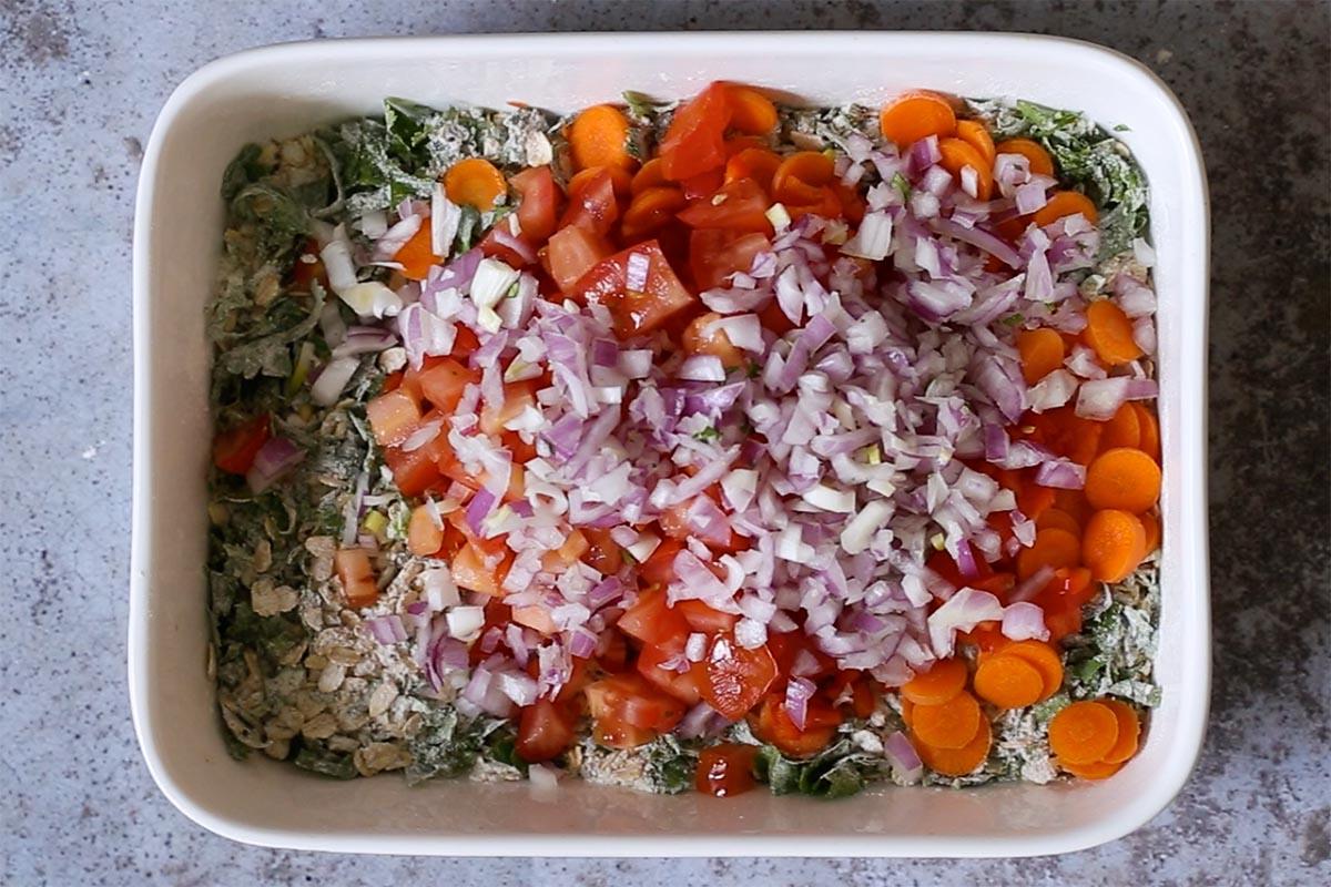 adding veggies to the savory oats mixture