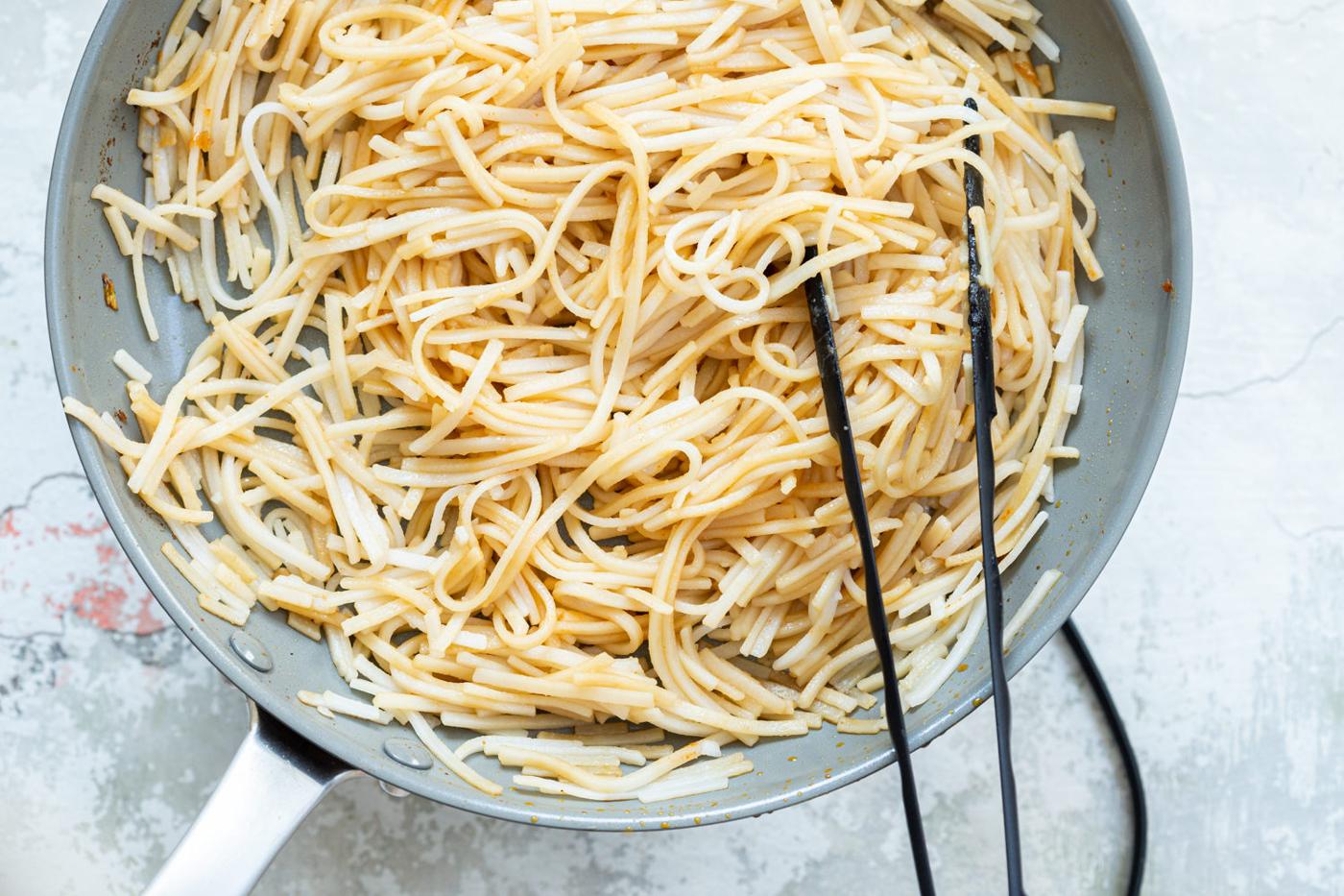 Our sesame noodles in grey skillet